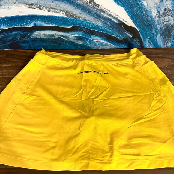 Runningskirts.com yellow women’s skort sz L (fits 10-12) - Picture 3 of 5